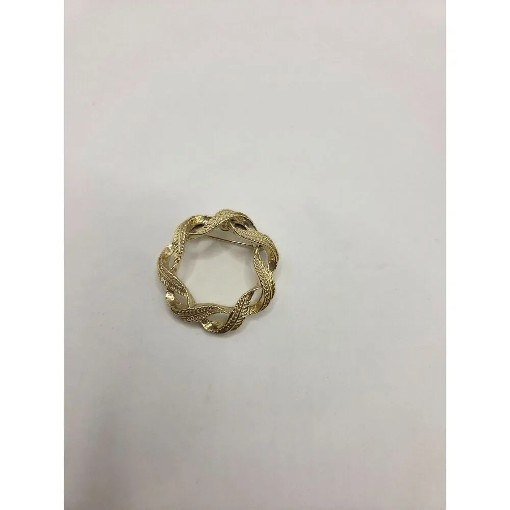1743. Set of Two Gold Tone Circle Brooch / Pins